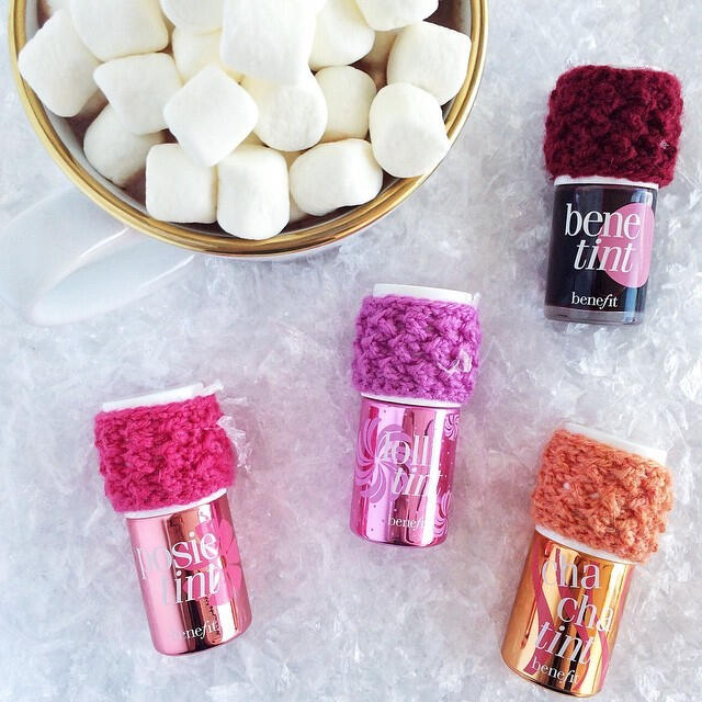 Crochet cozies are wrapped around Benefit Cosmetic tints matching the tint colours